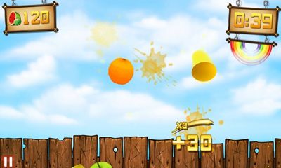 Screenshots of the game Fruit Ninja vs Skittles on Android phone, tablet.